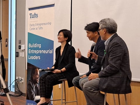 A speaker panel, moderated by Elaine Chen